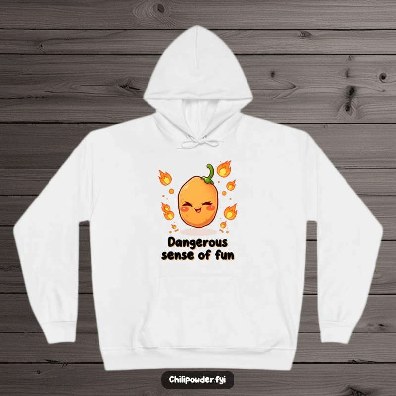 Funny hoodie depicting a mischievous chili powder grain expertly juggling small, glowing flame icons, radiating playful danger.