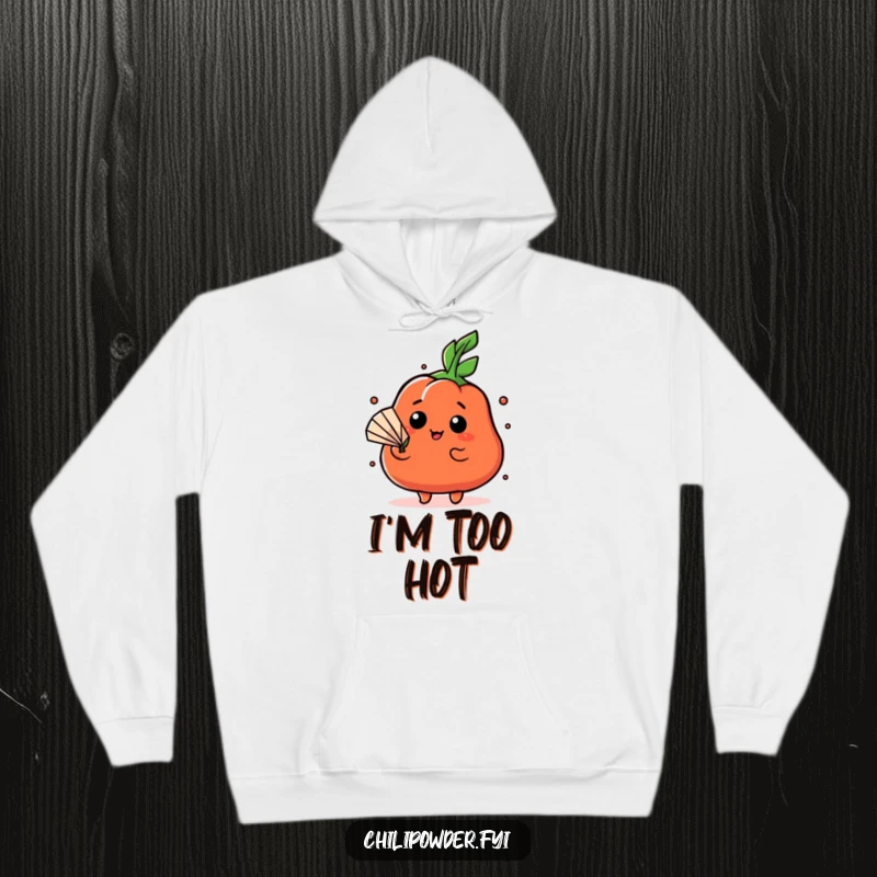 Funny Kawaii chili powder character fanning itself dramatically with a leaf on a cozy hoodie, conveying intense feelings.