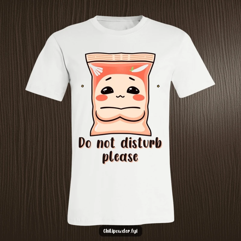 Funny chili powder t-shirt with a spice bag character making a pouting face with crossed arms, perfect for expressing mood.
