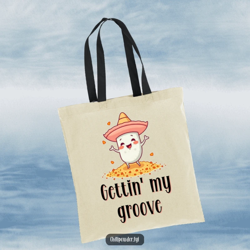 Funny tote bag featuring a chili powder character with a tiny sombrero, dancing energetically for festive fun.
